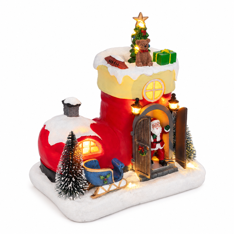 Feeric Lights & Christmas kerstdorp met kerstmanlaars - licht, muziek en beweging